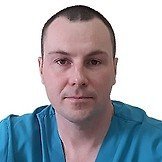 Врач Сухомлинов Олег Юрьевич